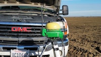 a gmc truck with a gps mounted on the hood